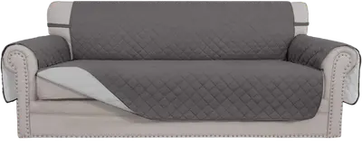 Gray quilted Easy-Going reversible cover protecting the seat, backrest, and arms of a sofa.